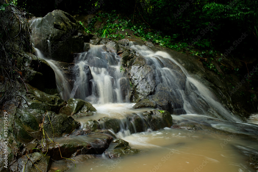 Waterfalls in the tropical forests of Asia Waterfalls in the tropical forests of Asia
