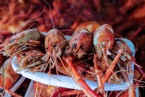 Red fried prawn for sale by street vendors