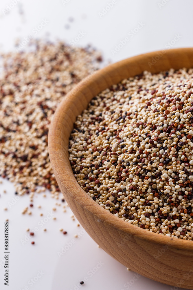 mix of quinoa grains on white acrylic background mix of quinoa grains on white acrylic background