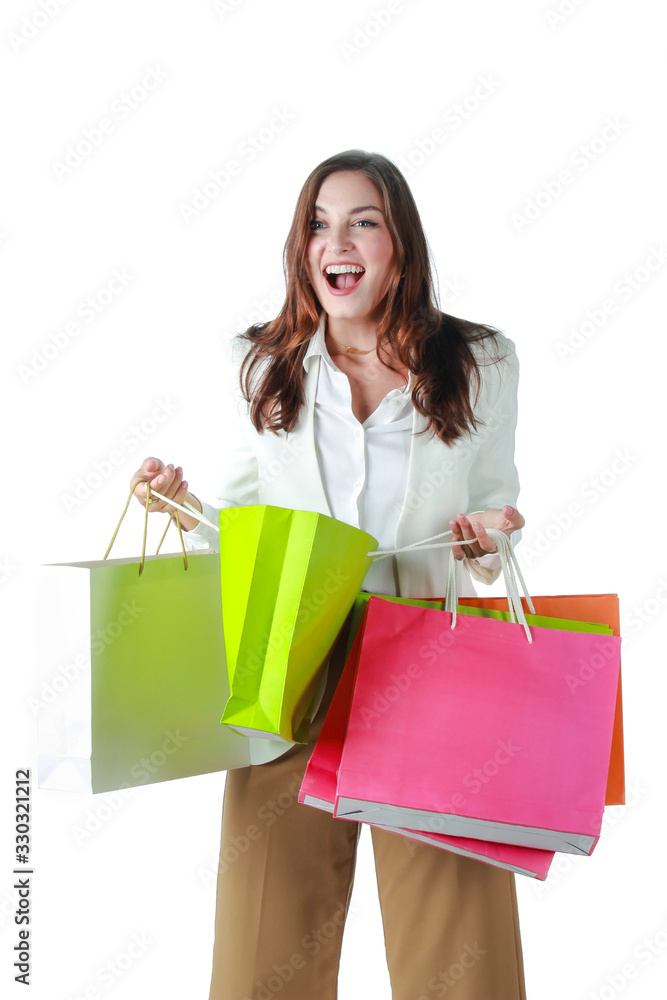 Portrait of young beautiful woman holding colorful shopping bag isolated on white background, happy female smile feeling so happiness and enjoy with black Friday, shopaholic concept