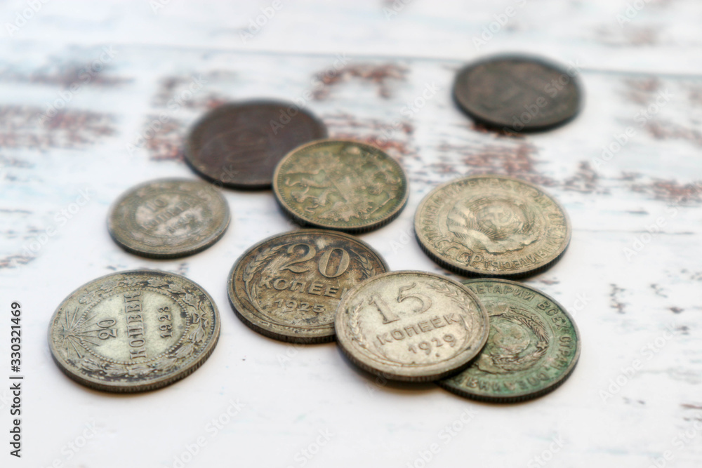 Old russian coins on wooden table background Old russian coins on wooden table background