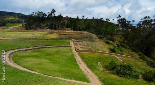 Ducts and Base walls of the archaeological complex of Ingapirca, at Cañar, Ecuador photo