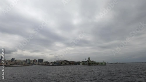 Tilt. Arrival by ferry to Rio de Janeiro. Fiscal Island on the horizon. photo