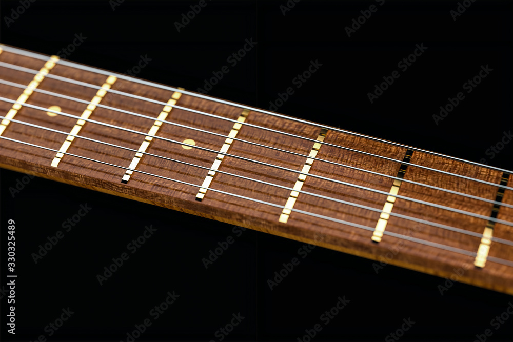 3D illustration. Acoustic guitar isolated on black background. Closeup. Detail of classic guitar. 3D illustration. Acoustic guitar isolated on black background. Closeup. Detail of classic guitar.