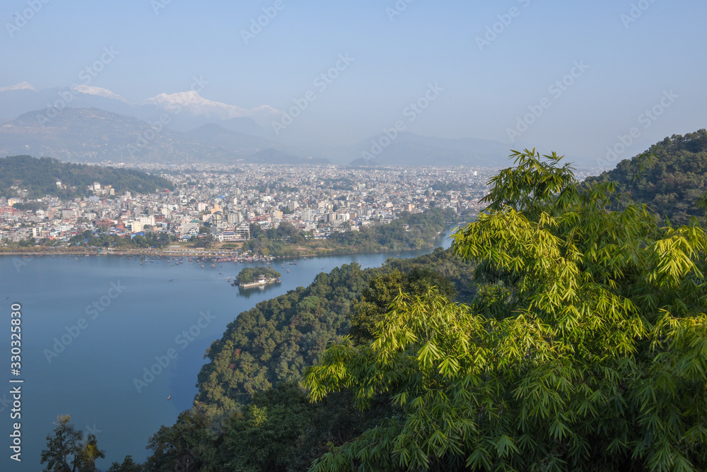 Arial view on Pokhara city, lake Phewa and the Himalayan range on Nepal