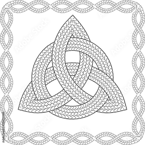 Black and white entwined celtic pagan symbol triquetra in ornamented frame