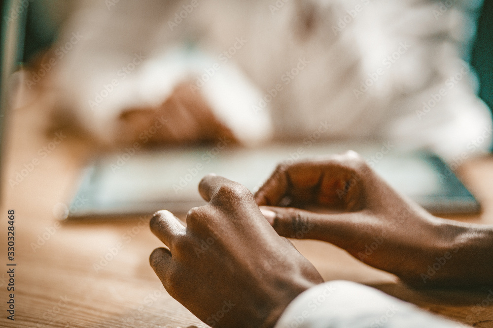 Obraz premium African Business Woman Going To Sign Documents At Business Meeting, Selective Focus Of Female Hands Holding Pen, Close Up, Toned Image