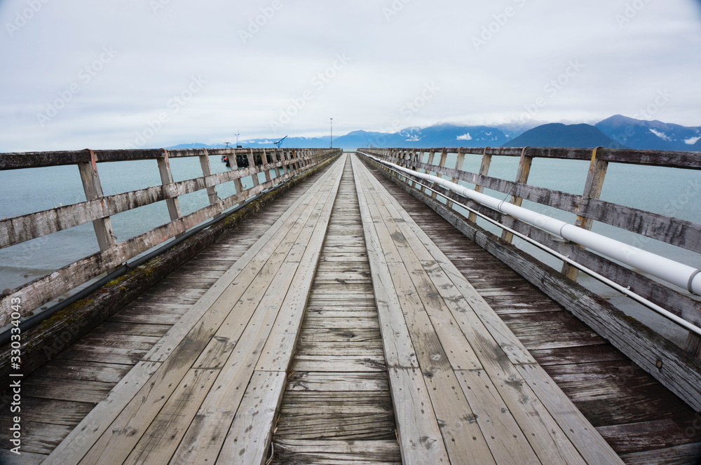 Pier in Jackson Bay Southern Island of New Zealand
