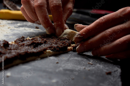 Baker prepares homemade cakes. Professional Female cook