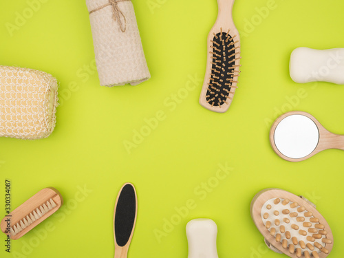 The bathroom accessories on green background.