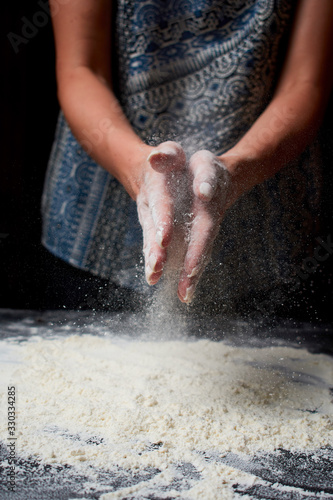 Baker prepares homemade cakes. Professional Female cook