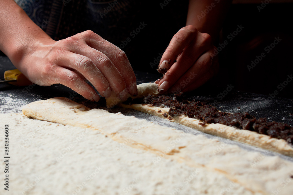 Baker prepares homemade cakes. Professional Female cook Baker prepares homemade cakes. Professional Female cook