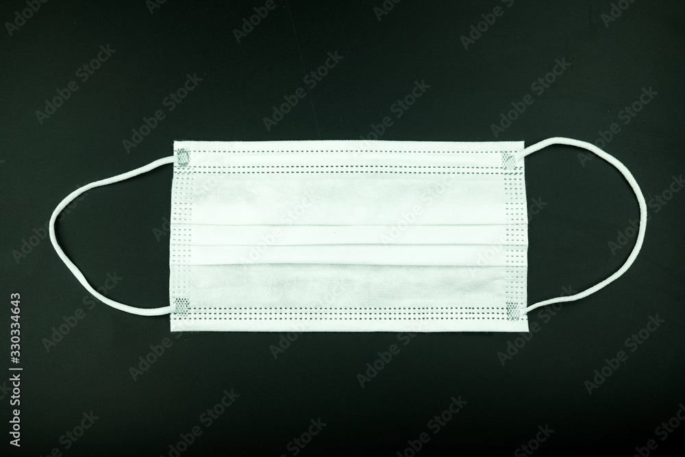 White mask protection for virus on black background White mask protection for virus on black background