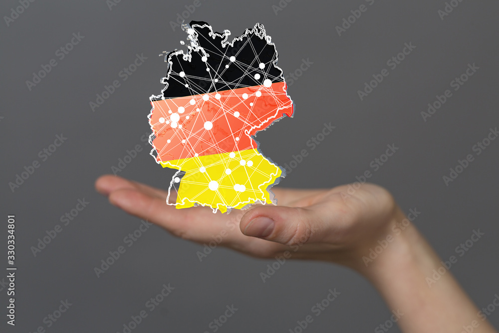 a virtual germany land map digital in hand 3d a virtual germany land map digital in hand 3d