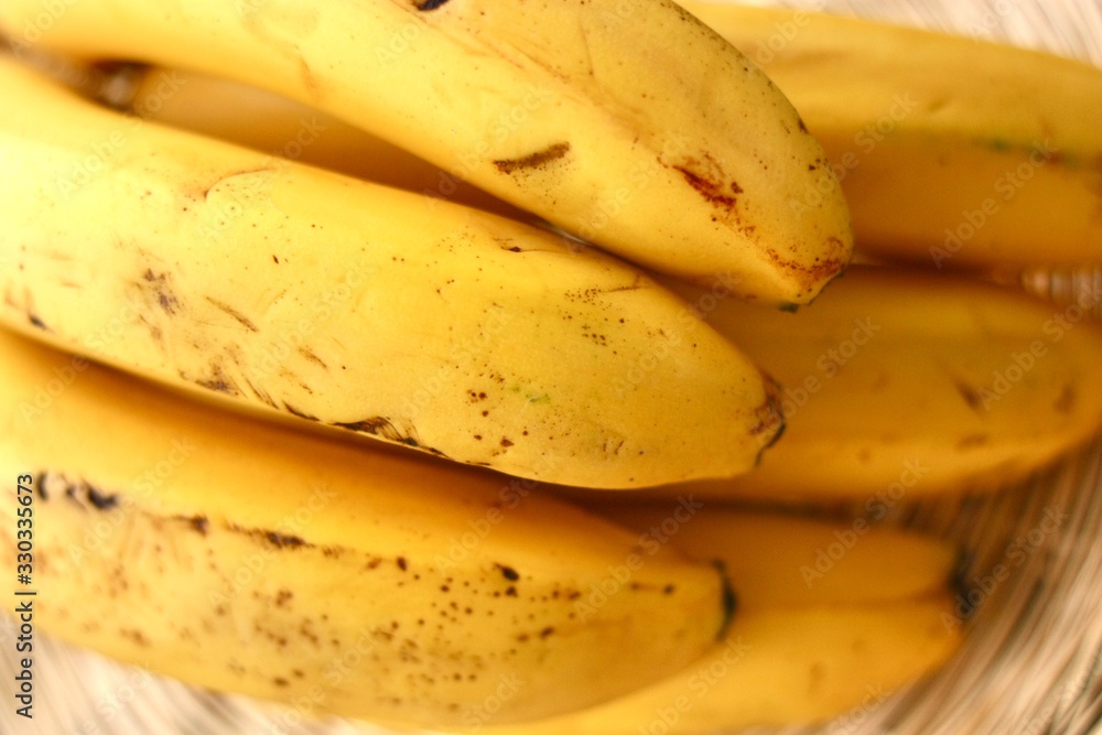Delicious ripe yellow bananas close up view 