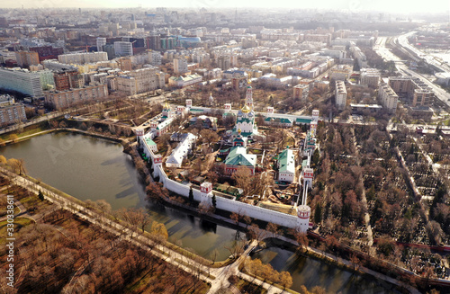 panoramic views of the lake, the fortress and the Christian temple of the big metropolis taken from the drone © константин константи