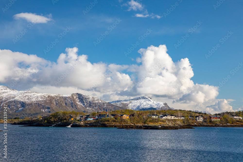 White clouds over mountains in outer Brønnøy municipality, Northern Norway