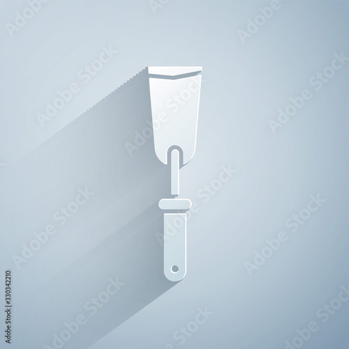 Paper cut Putty knife icon isolated on grey background. Spatula repair tool. Spackling or paint instruments. Paper art style. Vector Illustration