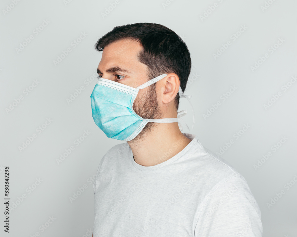 Man wearing a face mask against coronavirus Man wearing a face mask against coronavirus