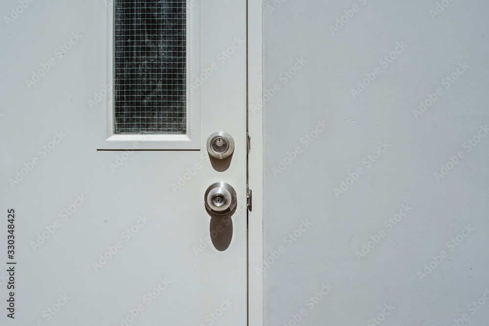 Stainless steel door handle and background photo Stainless steel door handle and background photo