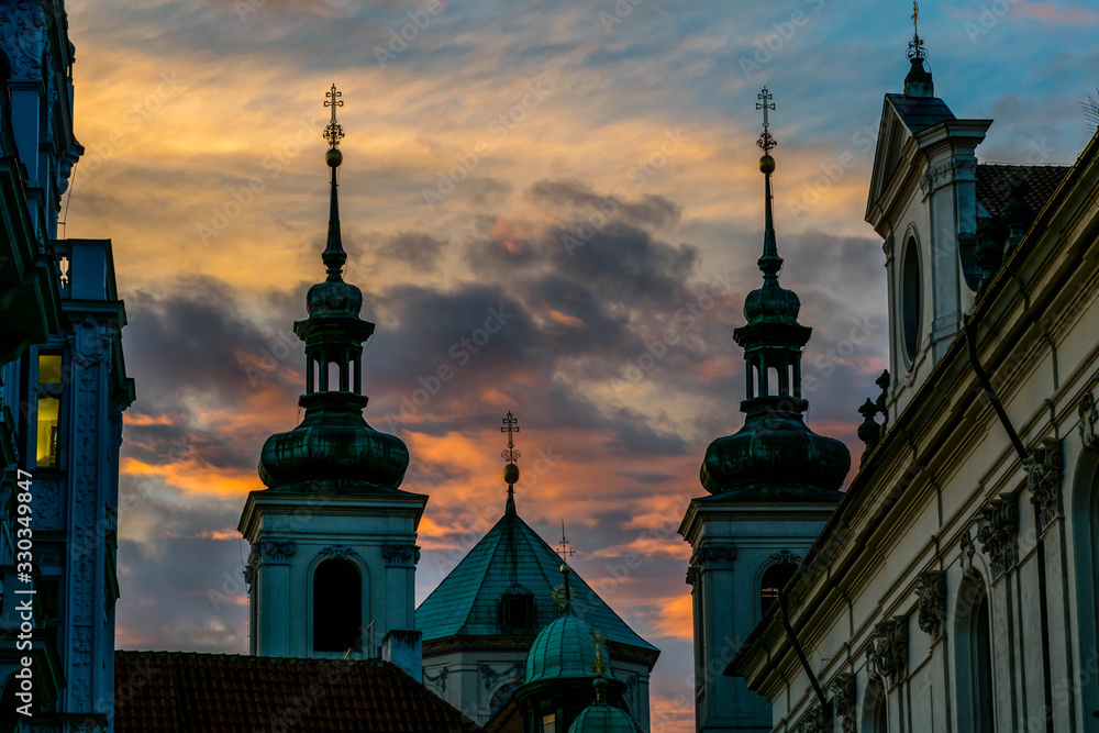 Church towers during colorful sunset