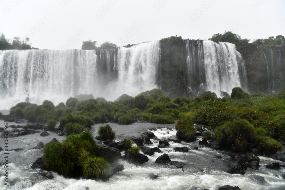 Fototapeta premium rushing waterfall and mountain river in the jungle