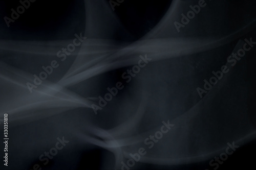 Plakat Black abstract background and smoke.
