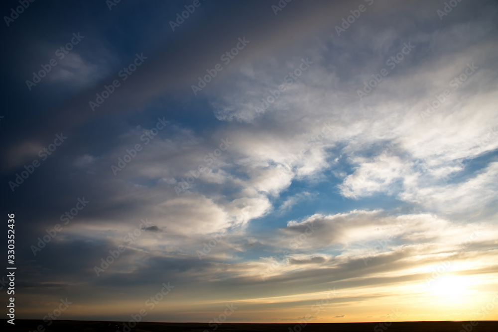 Russia. Western Siberia. Panorama of the evening sky over the fields near the city of Omsk. Russia. Western Siberia. Panorama of the evening sky over the fields near the city of Omsk.