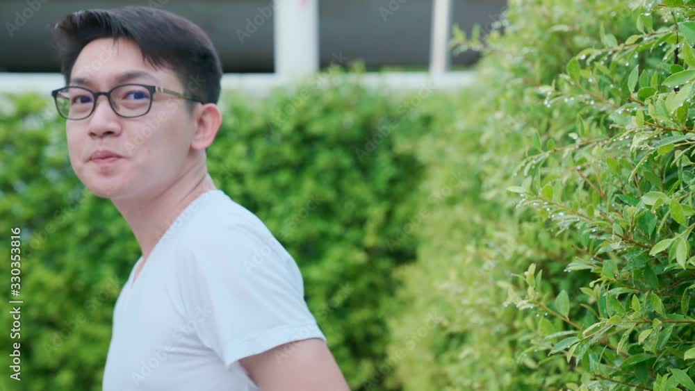 happiness young glasses asian casual white tshirt laugh with joyful in home garden background happiness young glasses asian casual white tshirt laugh with joyful in home garden background