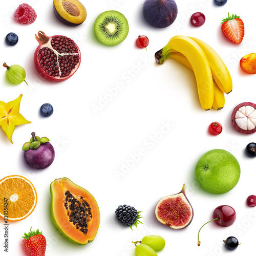 Frame made of different fruits and berries  flat lay  top view