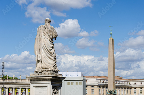 Saint Peter against the obelisc at Vatican photo