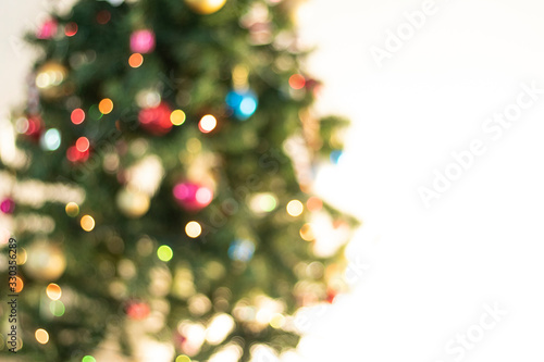 Defocused christmas background. Christimas tree  decoration and lights 