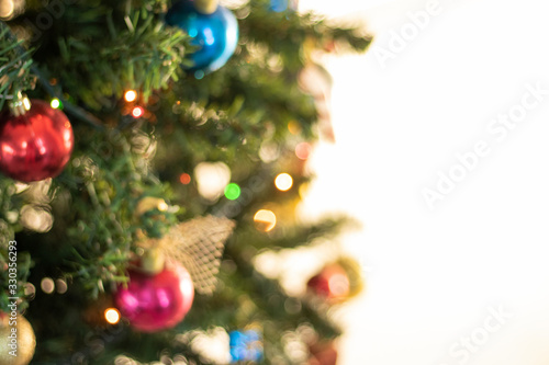 Defocused christmas background. Christimas tree, decoration and lights 