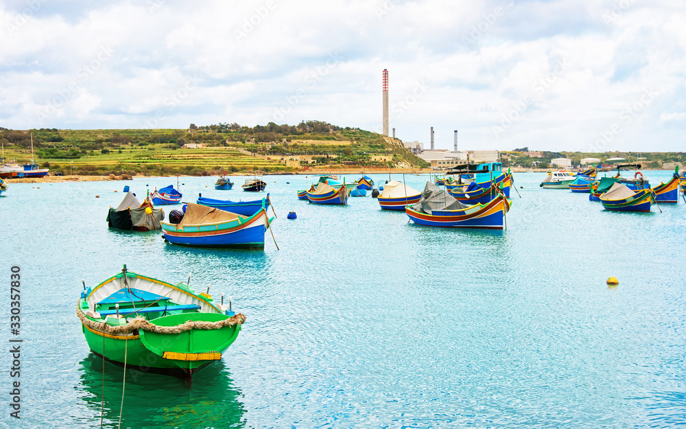 Luzzu colorful boats at Marsaxlokk Bay Malta