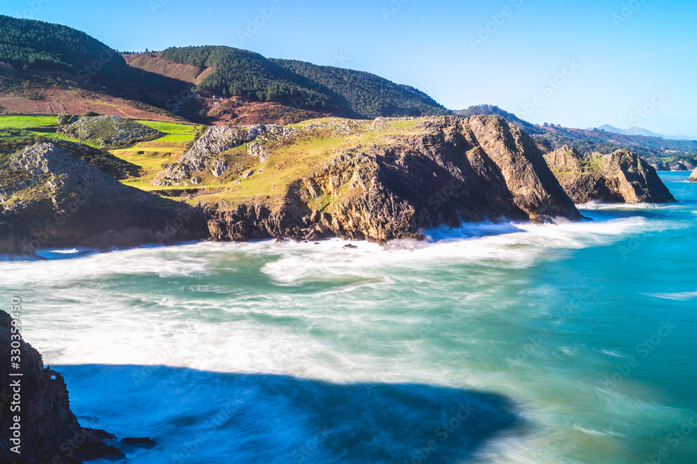 Long exposure photography of cove with cliffs on sunny day, Prel