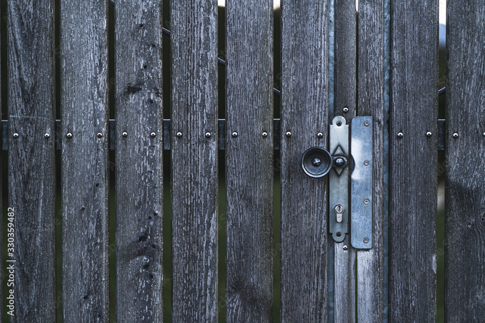 old wooden door with a lock old wooden door with a lock