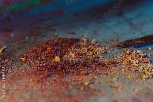 close up of wood shavings on blue workbench © Suh5pence