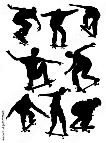 set of silhouettes of skateboarders vector