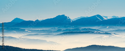 Krivanska Mala Fatra, Velky Chos and part of Nizke Tatry mountains from Lysa hora hill in winter Moravskoslezske Beskydy mountains in Czech republic