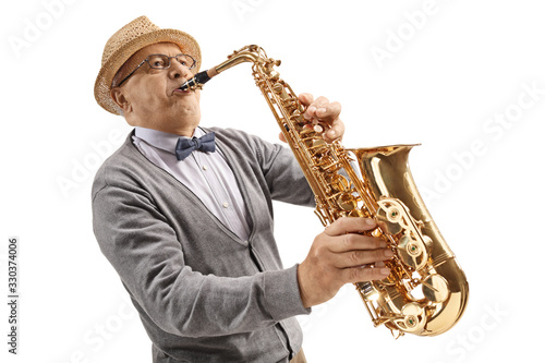 Canvas Print Mature male musician playing a saxophone