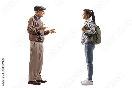 Female student and a senior man having a conversation