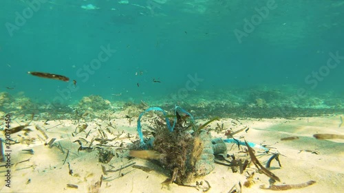 Plastic Pollution on Bottom of the Sea. Plastic Trash Under Water. plastic debris on seabed in Mediterranean Sea