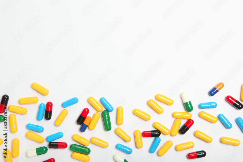 pills on a light background top view. Medicine, treatment, illness. Medication in tablets. pills on a light background top view. Medicine, treatment, illness. Medication in tablets.