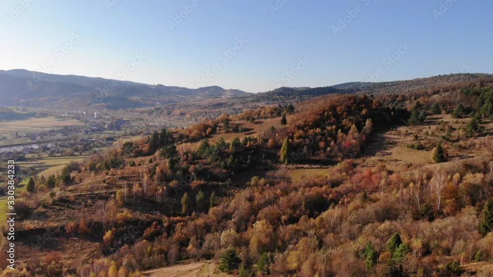 Bird's eye view of beautiful autumn landscape in Carpathians. Aerial Drone 4K cinematic footage Bird's eye view of beautiful autumn landscape in Carpathians. Aerial Drone 4K cinematic footage