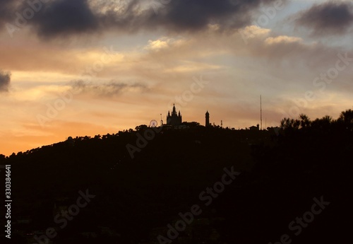 The silhouette of a fairytale castle on top of a mountain...