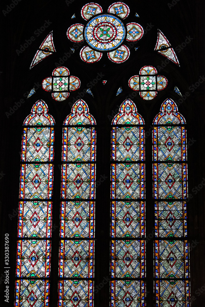 Mosaic of a stained glass arched window in Notre Dame de Paris, before the fire