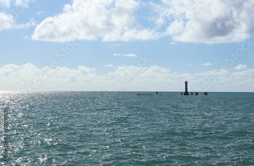 Sea and lighthouse of Ponta Verde beach, Maceio city, Alagoas state, Brazil.