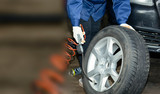 Tire inflation, wheel replacement, worker, service, place for text