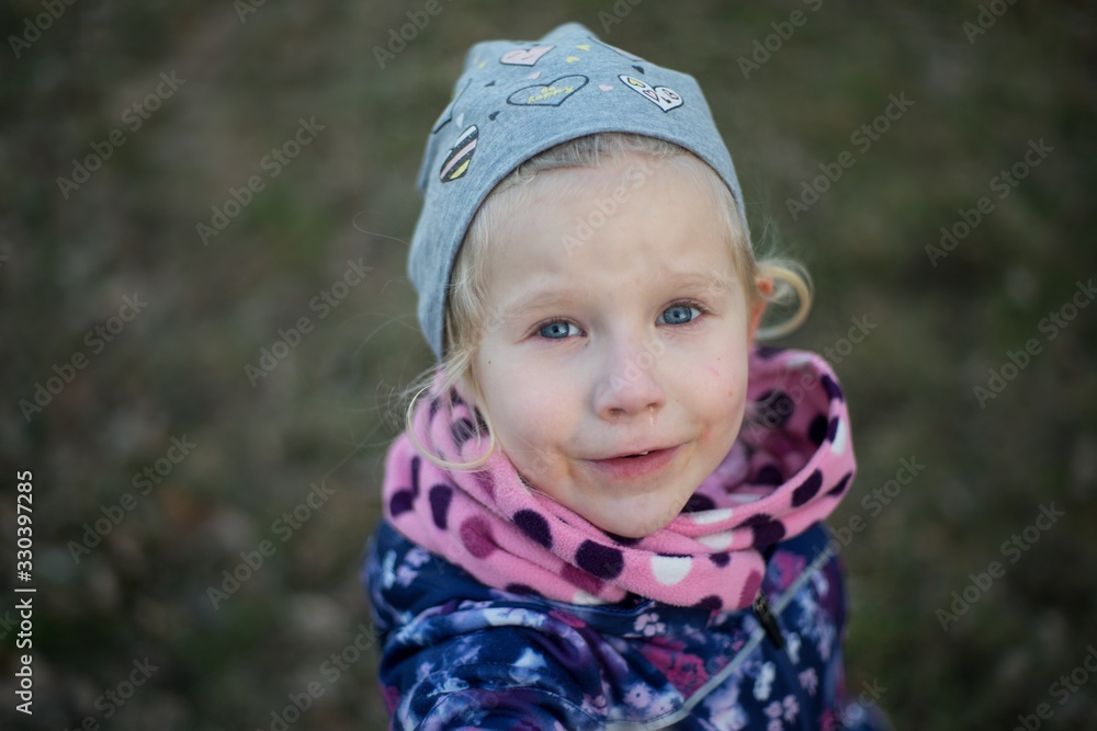Little girl portrait playing in spring in nature. Little girl portrait playing in spring in nature.