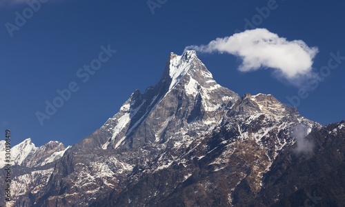 View of Machapuchare  Machhapuchchhre or Machhapuchhre Mountain Peak  also known as Fish Tail  in Nepal Himalayas on Annapurna Base Camp Hiking or Trekking Route